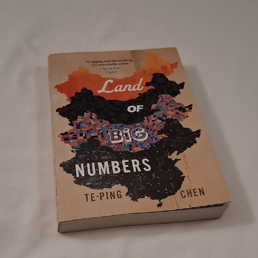 New Copy Of Land of Big Numbers Book by Te-Ping Chen